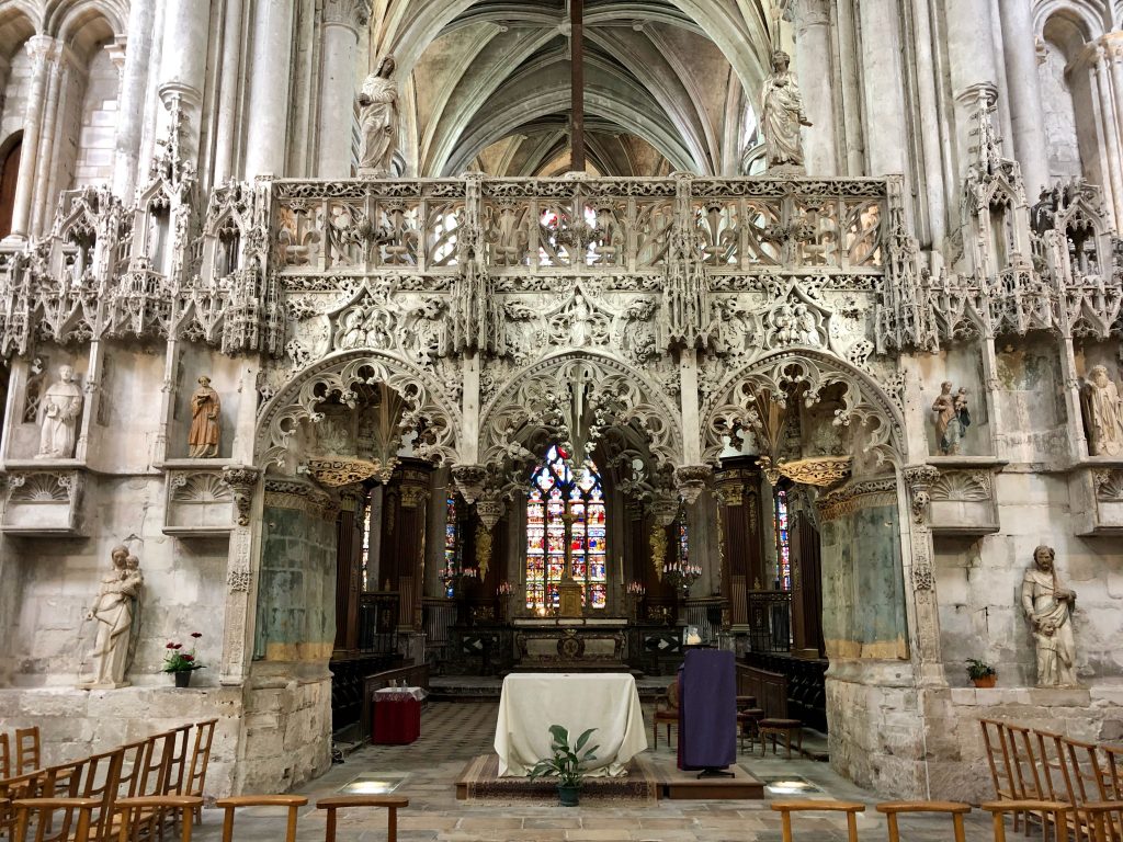 ornate stone rood screen inside Église Sainte-Madeleine in Troyes, France