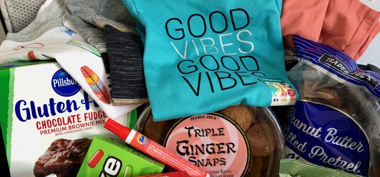 American products and foods piled into a suitcase on the way to France to be given as gifts